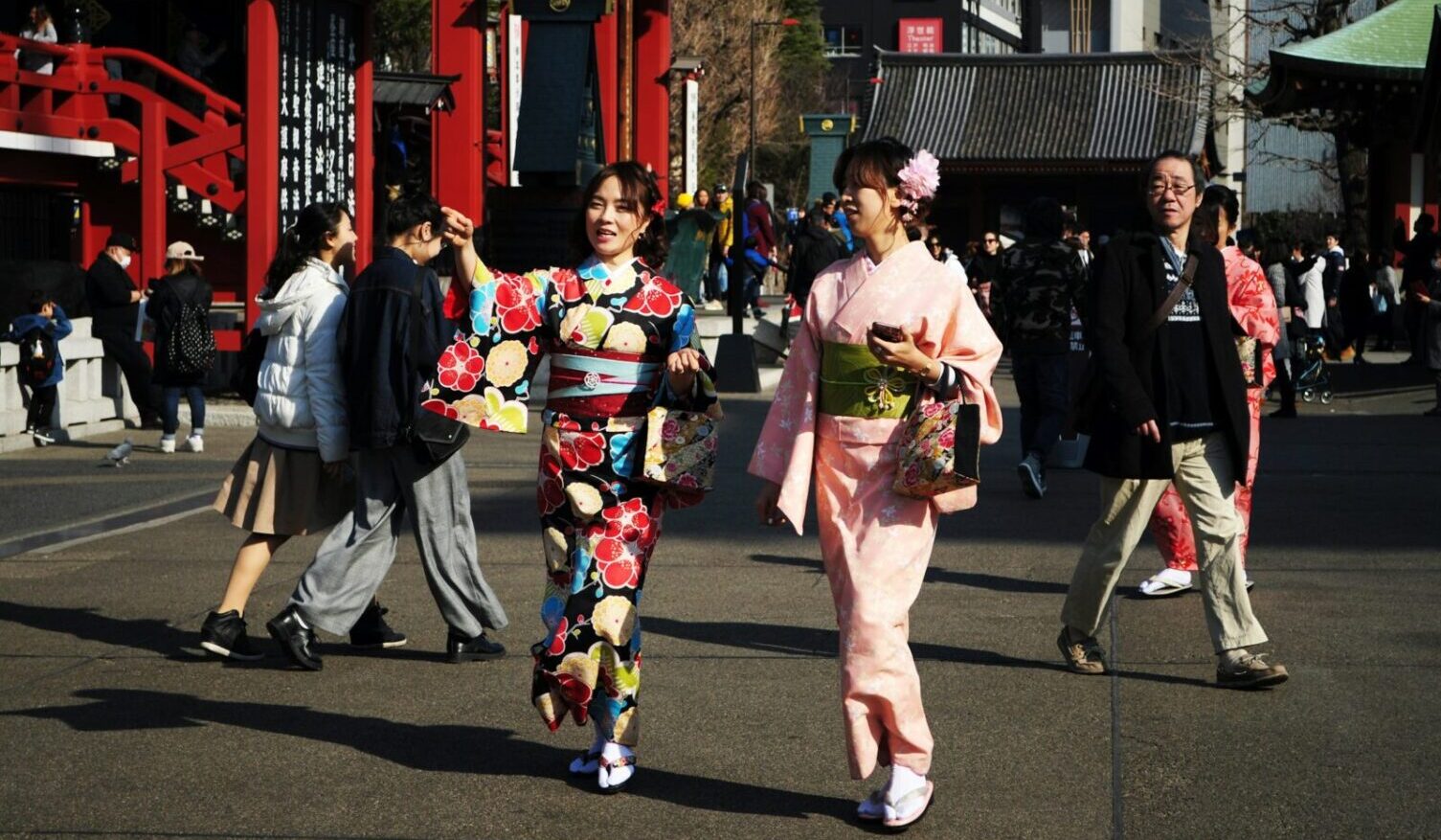 Japan Women dressed in traditional clothing walking down the pavement in Asakusa Tokyo Maria Cassagne Women dressed in traditional clothing walking down the pavement in Asakusa Tokyo. Photo by Maria Cassagne